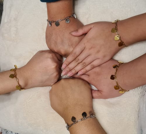 Customer photo review of Bracelet with Personalised Heart Pendants