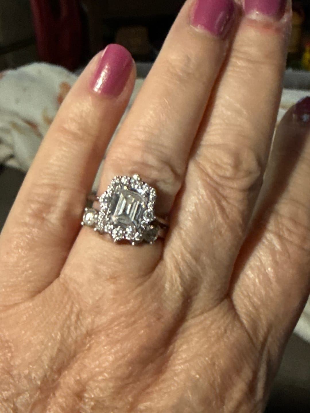 Customer photo review of Vintage 3.0Ct Halo Emerald Cut White Stone Engagement Ring In Sterling Silver