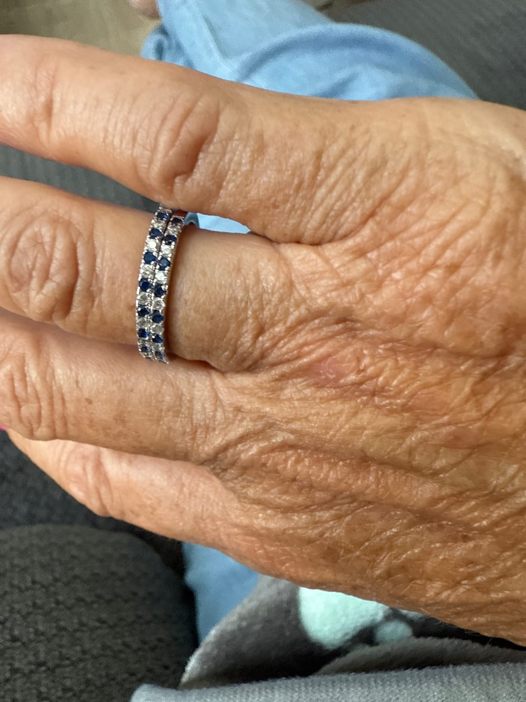 Customer photo review of Louily 0.3 CT Round Cut Half Eternity Blue And White Sapphire Wedding Band For Women In Sterling Silver
