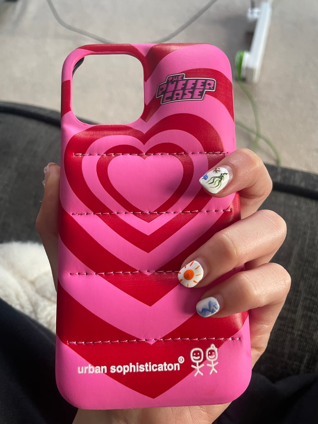 Customer photo review of Love Is Love Puffer Case