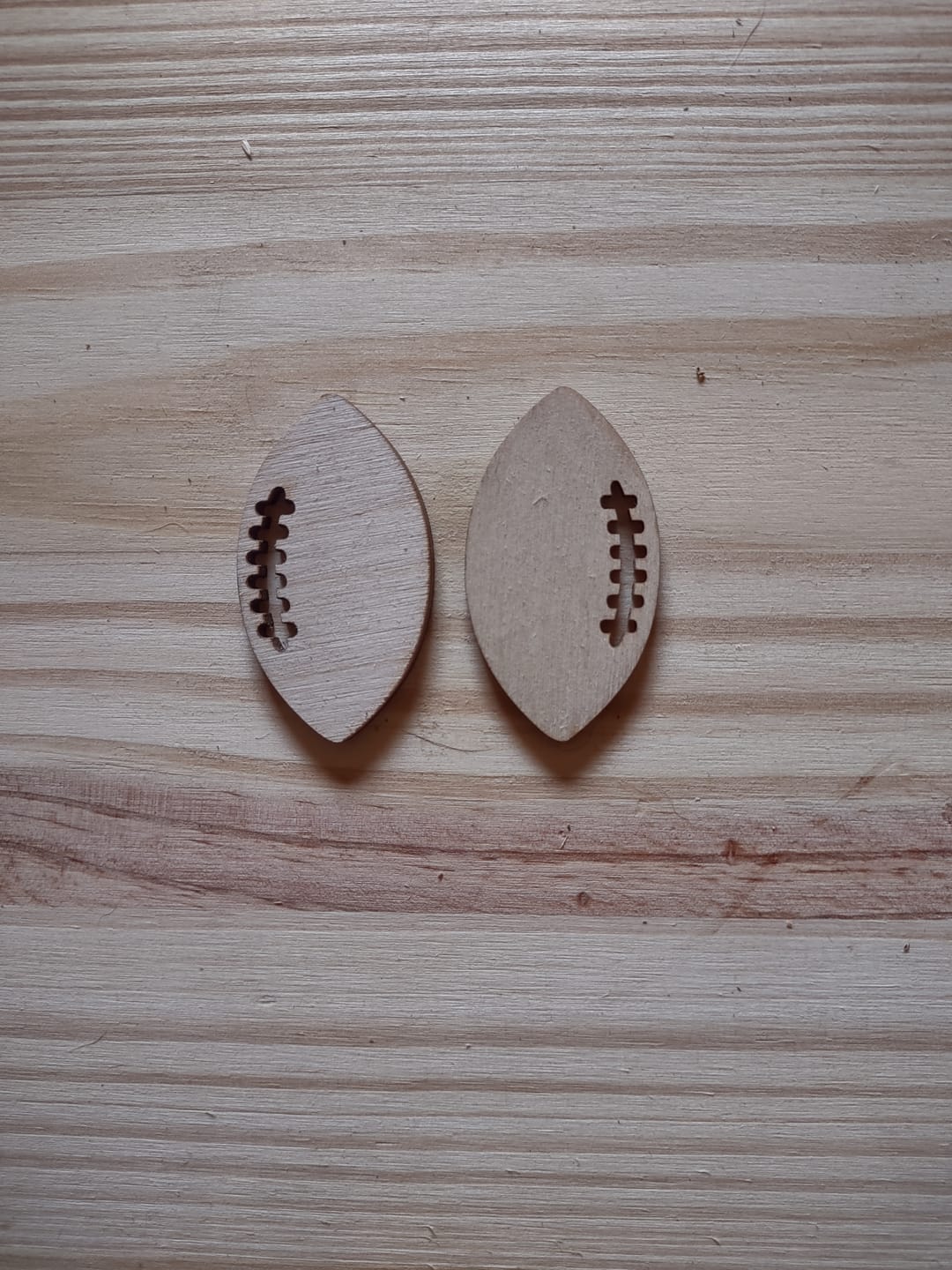 Customer photo review of Unfinished Wood Football Threads Shape - Sports Craft - up to 46" DIY