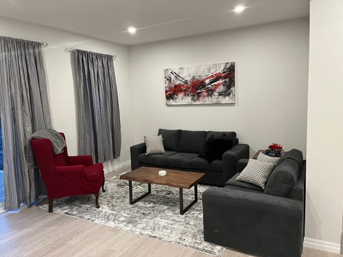 Customer photo review of 'Abstract Red & Black' Framed Canvas (60"W x 30"H)
