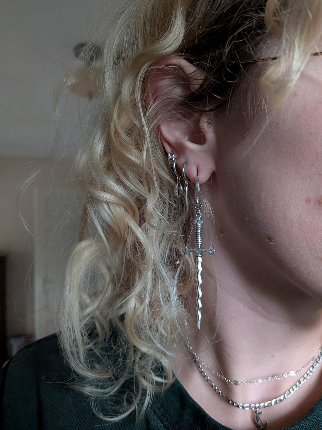 Customer photo review of Wavy Sword Earrings