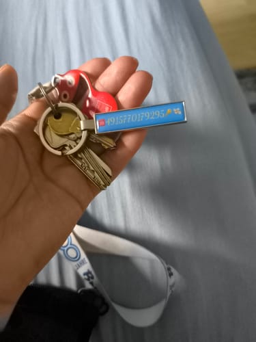 Customer photo review of Metall Schlüsselanhänger personalisiert mit Name, Text, Spruch und Foto