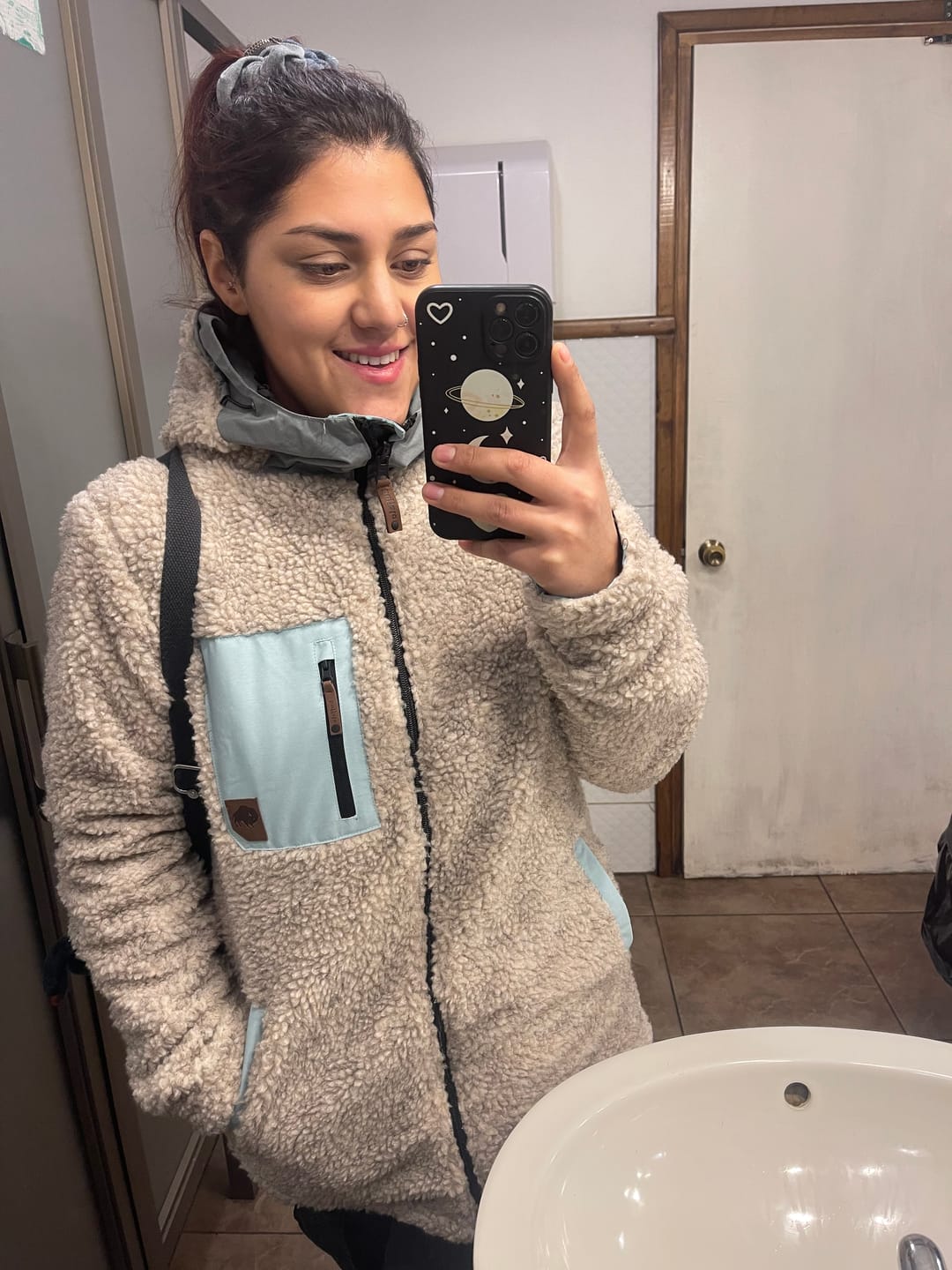Customer photo review of Parka Impermeable Reversible Camaleon Mujer