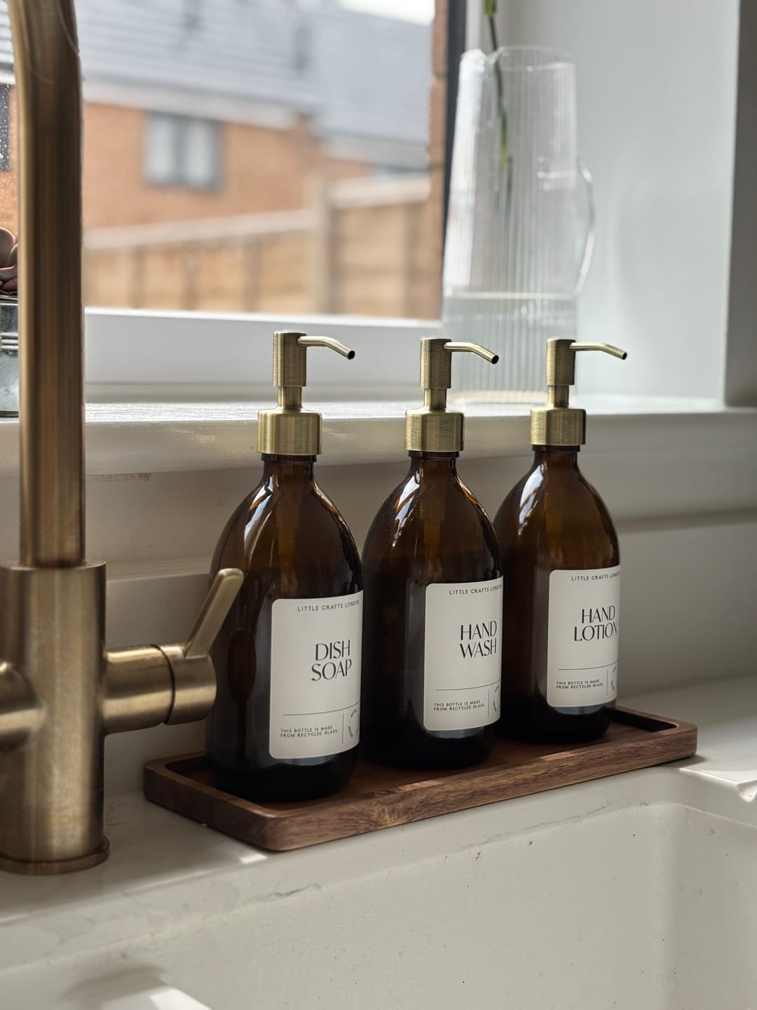Customer photo review of Set of 3 Reusable Amber Glass Bottles 500 ML with Stainless Steel Pump and Long Tray