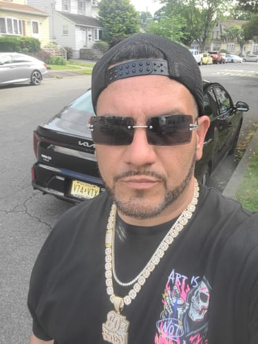 Customer photo review of Iced Out 80'S BABY Pendant
