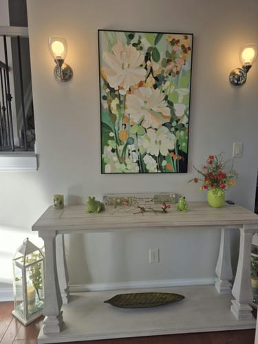 Customer photo review of Enchanted Blooms Abstract Floral Canvas – Hand-Painted Vertical Wall Art for Living Room