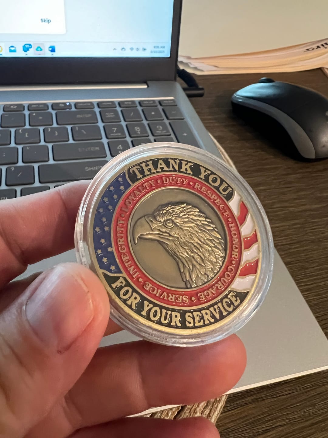 Customer photo review of Honoring All Who Served Thank You Coin