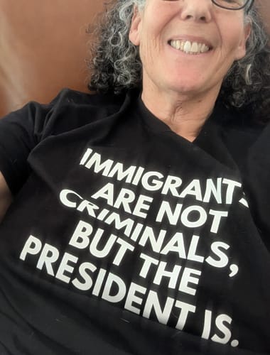 Customer photo review of Immigrants Front English and Back Spanish Unisex T-Shirt