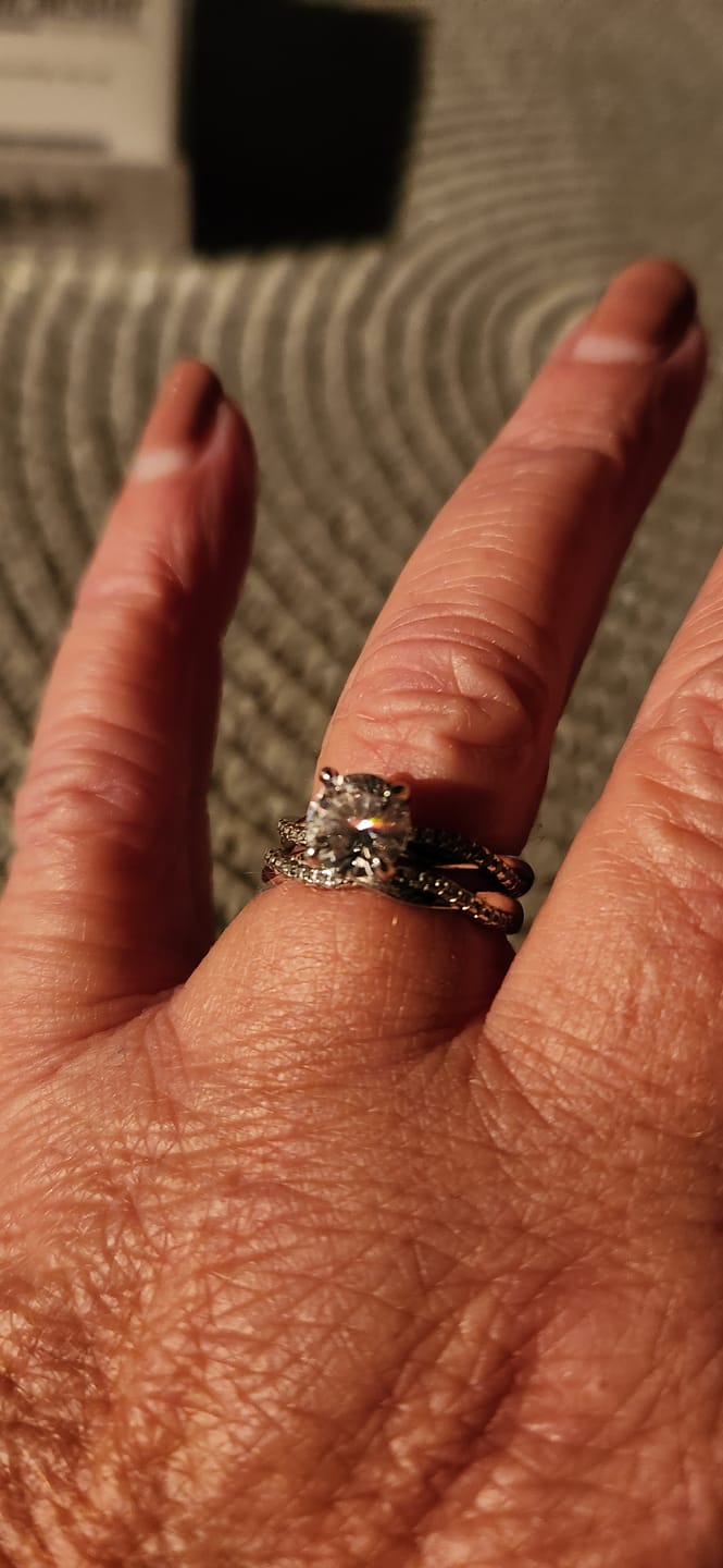 Customer photo review of Louily Twist Eternity Wedding Band for Women In Sterling Silver