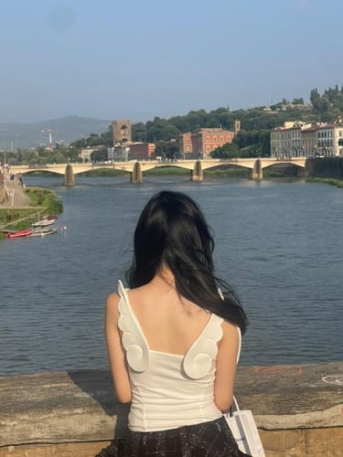 Customer photo review of Rase le sol Cross-Stitched Winged Strap Bow Tank Top