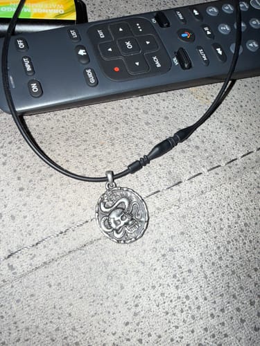 Customer photo review of Memento Mori Talisman Necklace: Helps Pair Veterans With A Service Dog Or Shelter Dog