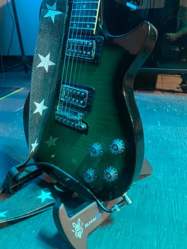 Customer photo review of BunnyNest A-Frame Guitar Stand – Collapsible, Lightweight, Portable, & Universal for Acoustic, Electric, and Bass Guitars