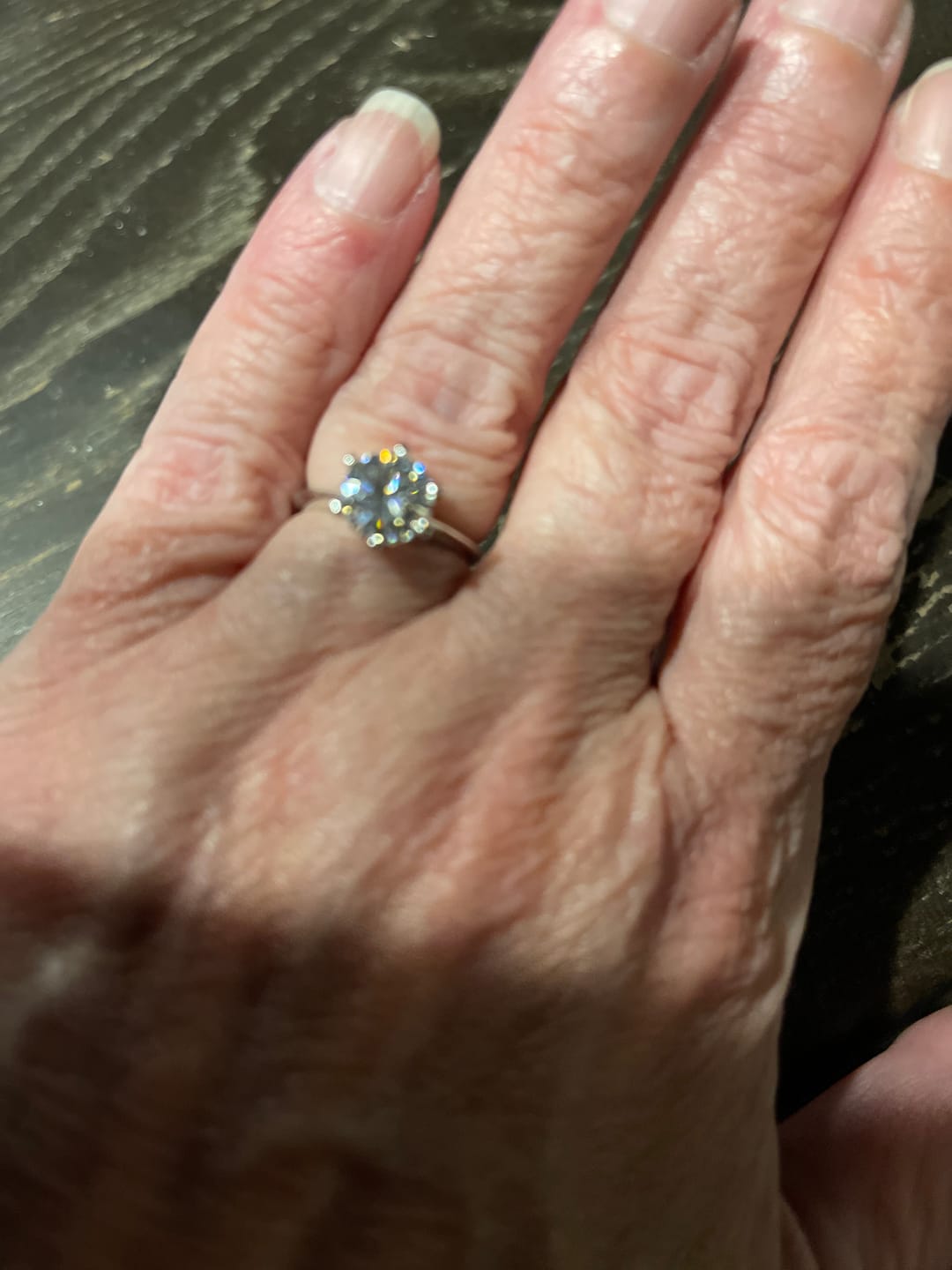Customer photo review of Classic Solitaire Moissanite Six-Prong Sterling Silver Engagement Ring