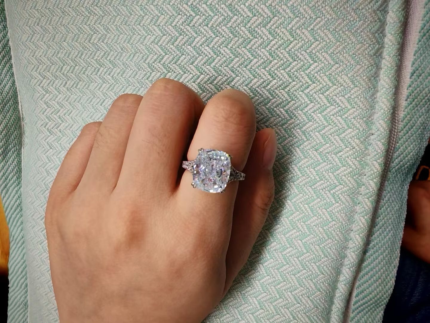 Customer photo review of S925 7.0Ct/4.0Ct Split Shank Cushion Cut Engagement Ring 18K White Gold Plated Travel Rings with Pavé Accents