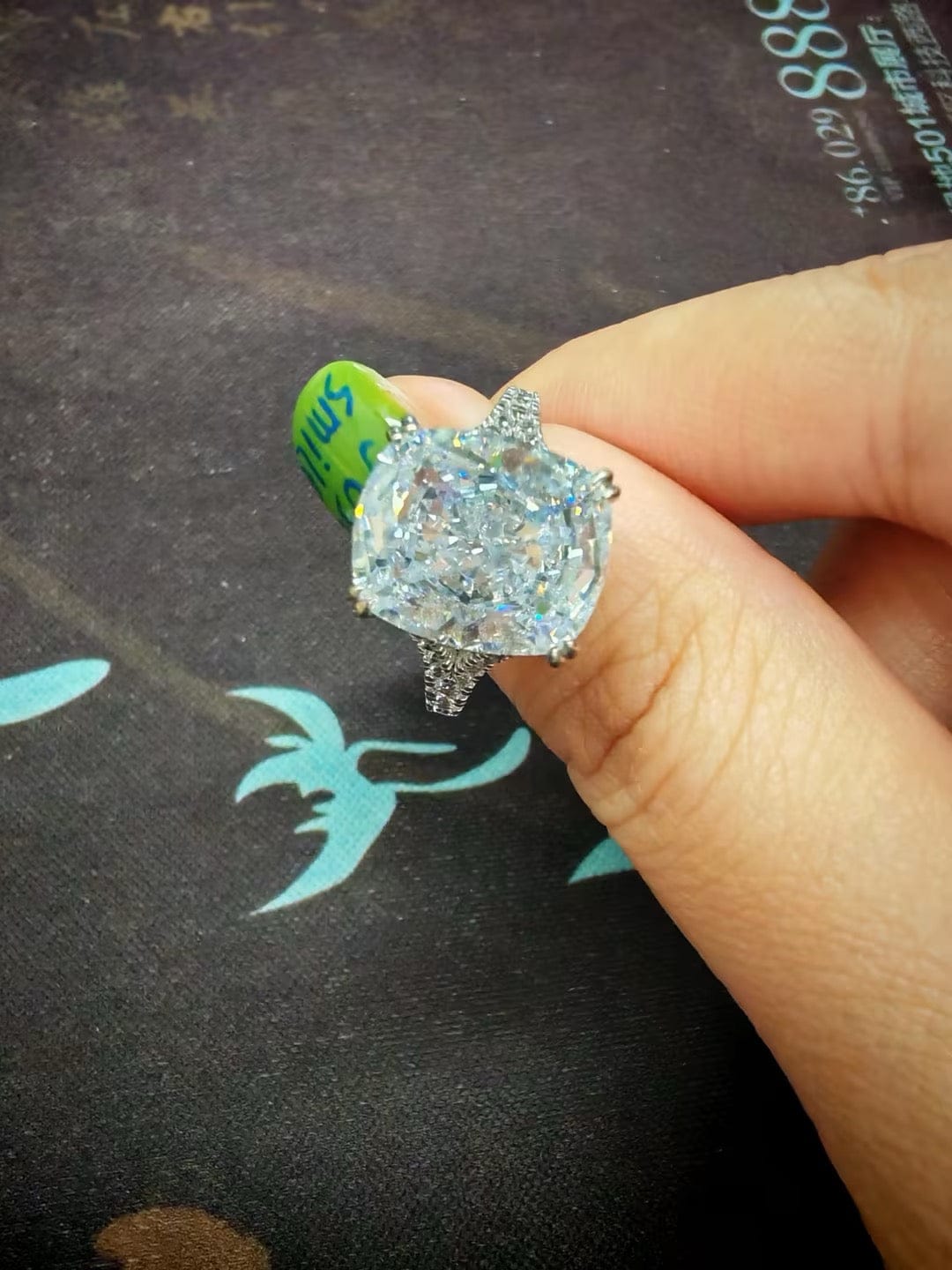 Customer photo review of S925 7.0Ct/4.0Ct Split Shank Cushion Cut Engagement Ring 18K White Gold Plated Travel Rings with Pavé Accents