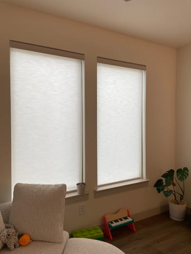 Customer photo review of SmartWings Motorized Light Filtering Roller Shades 70% Blackout Essential