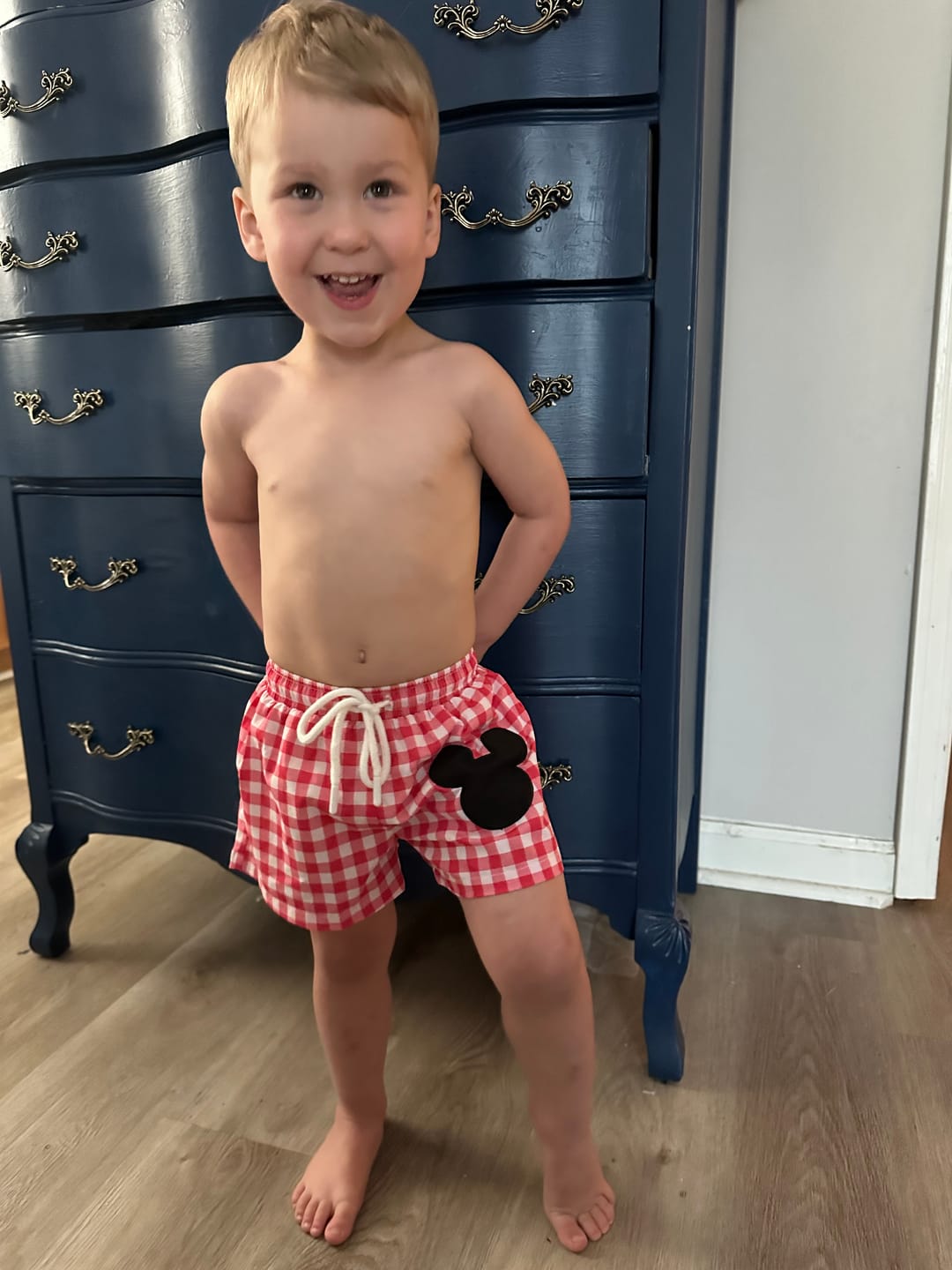Customer photo review of Red Mouse Ears Swim Trunks