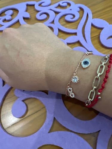 Customer photo review of PULSERA BRAZALETE INFINITY OJO SWAROVSKI + KIT DE REGALO