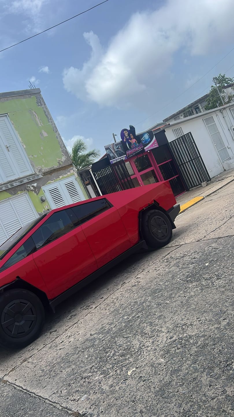 Customer photo review of Glossy Metallic Vampire Red Vinyl Wrap