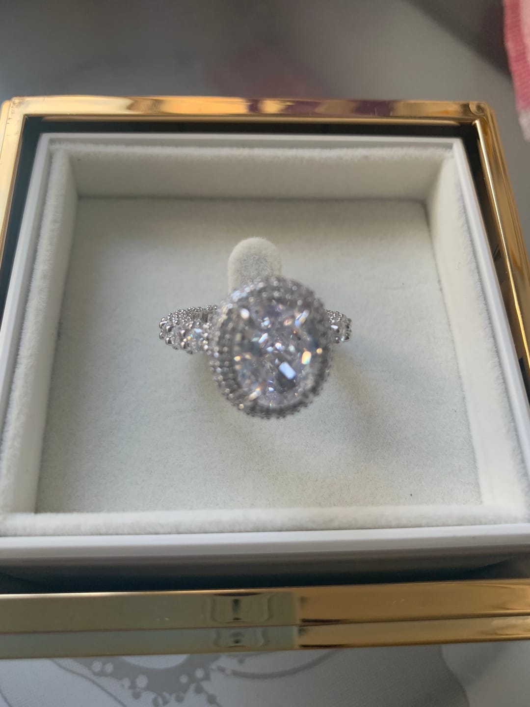 Customer photo review of Gorgeous Hidden Halo Oval Cut 4.0ct Engagement Ring In Sterling Silver