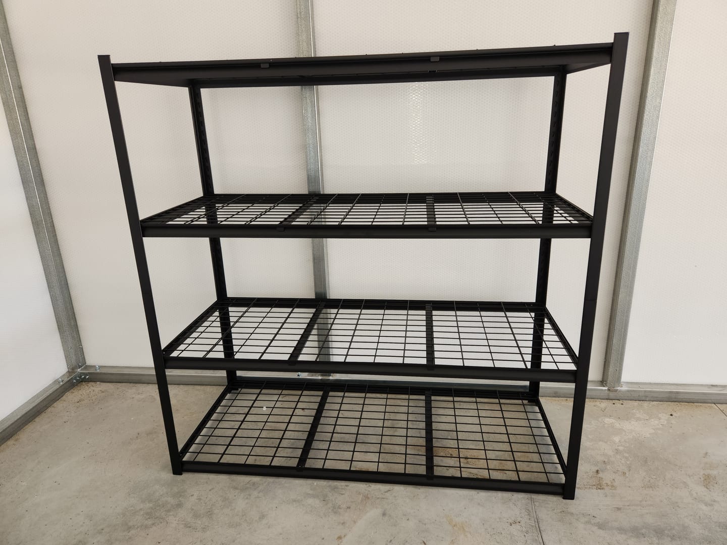 Customer photo review of REIBII 4-Shelf Storage Shelves 2550LBS Adjustable Heavy Duty Garage Shelving for Garage Basement