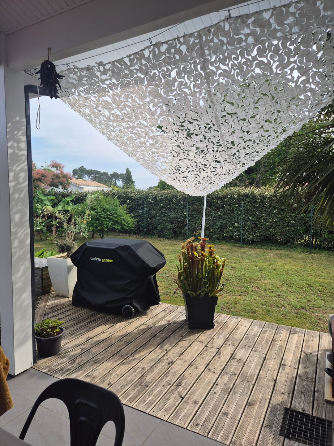 Customer photo review of Filet de camouflage triangulaire blanc