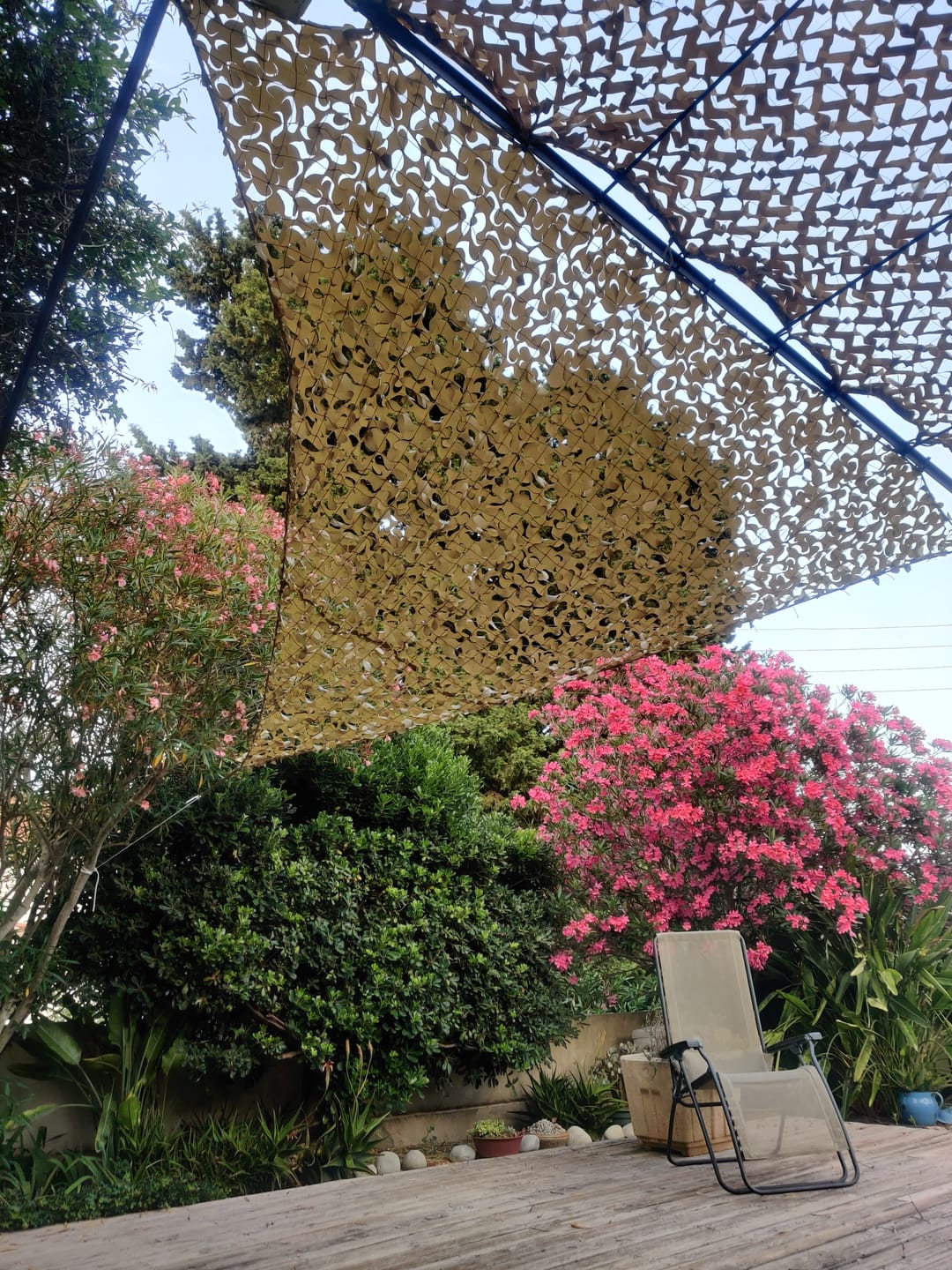 Customer photo review of Filet de camouflage triangulaire sable