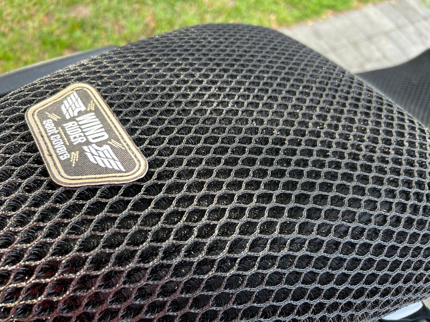 Wind Rider mesh seat cover on a Triumph Tiger Sport 660