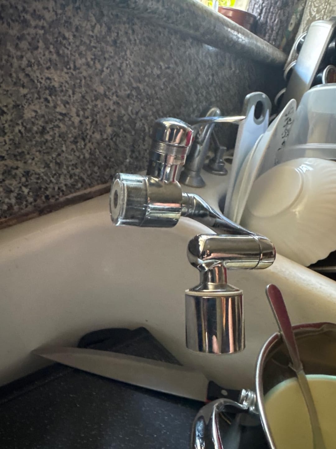 Customer photo review of Frizzlife Splash-Proof Sink Faucet Extender with Filter, NSF Certified Reduce 99% Chlorine, 1080° Rotating Tap Aerator, 2 Modes Spray Attachment for Kitchen/Bathroom/Toddlers, 8pcs Replacement Filter