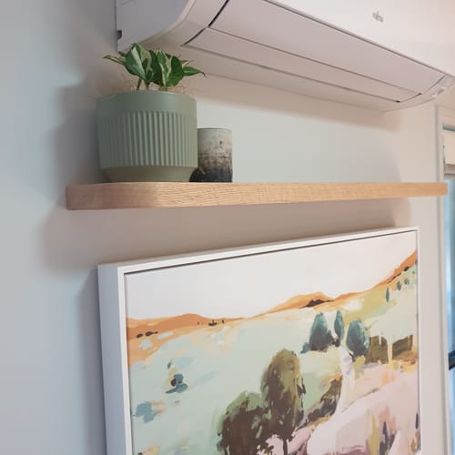 Customer photo review of Curved Floating Shelf
