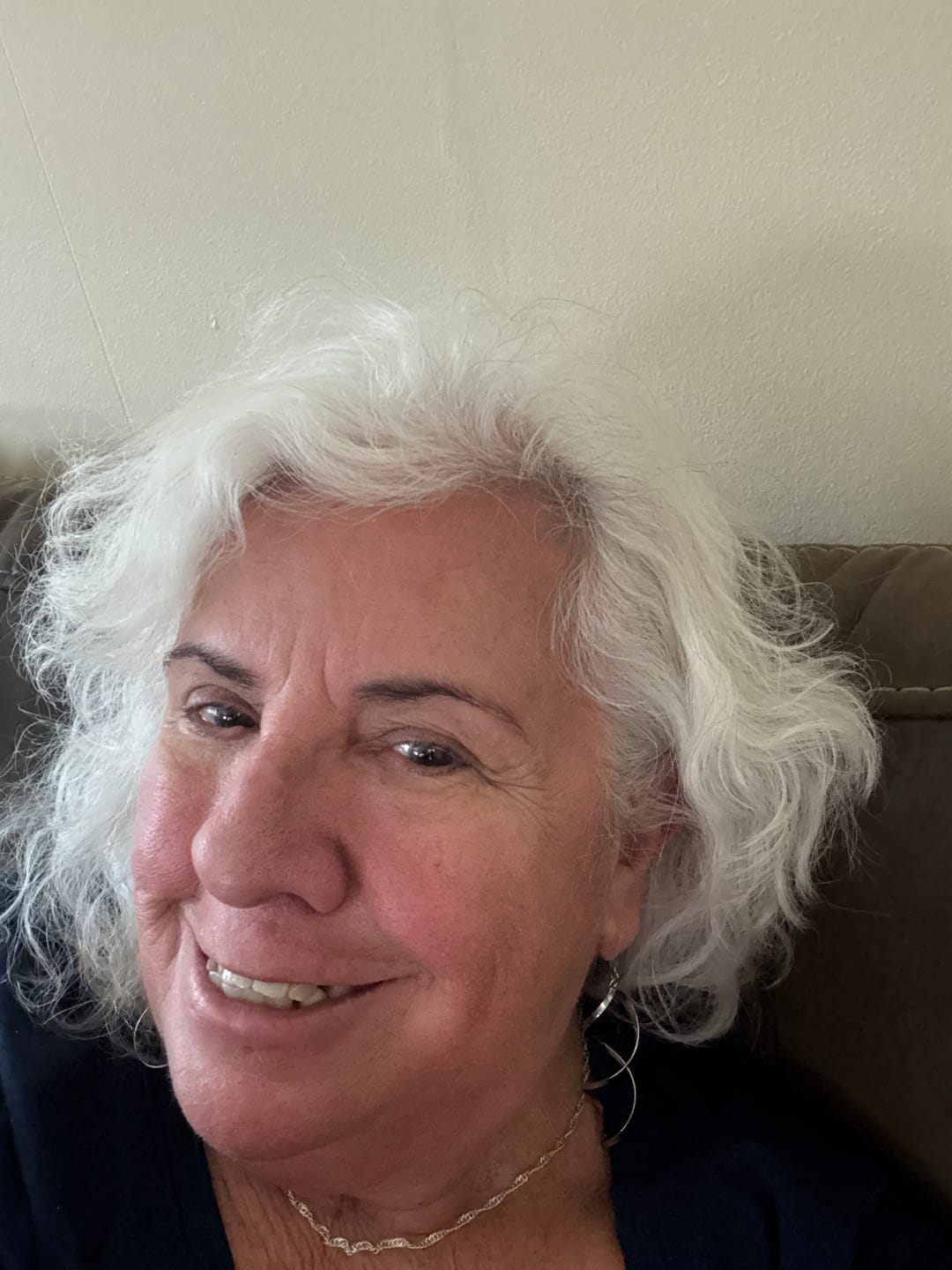 Customer photo review of Infinity Spiral Dangles Hypoallergenic Earrings for Sensitive Ears Made with Plastic Posts