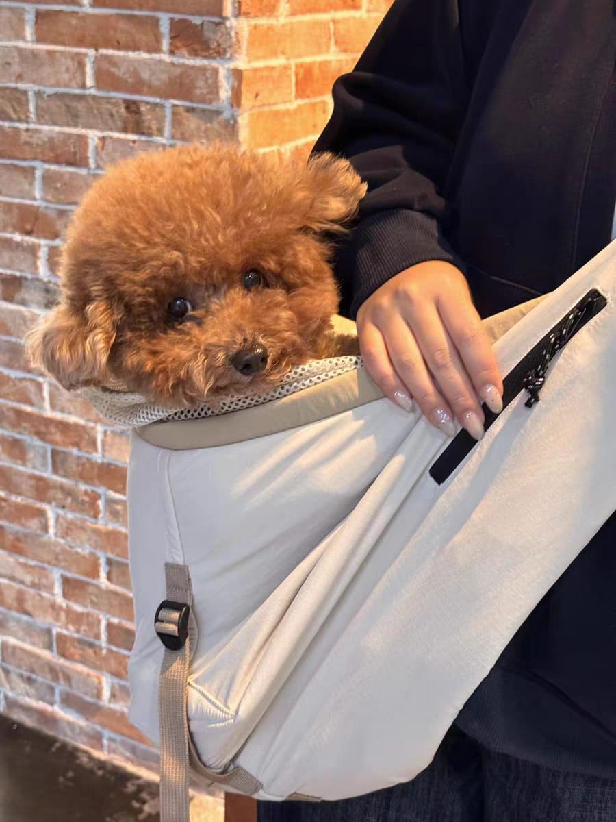 Customer photo review of Wide-Strap Cradle-Style Structured Pet Sling Carrier Bag