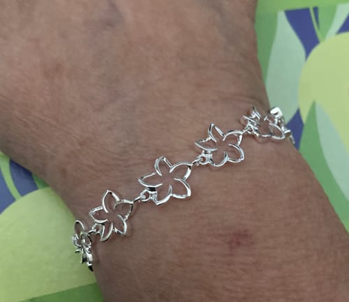 Customer photo review of Sterling Silver 12mm Floating Plumeria Bracelet