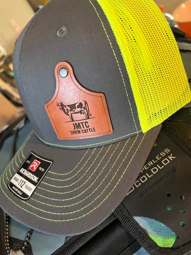 Customer photo review of Custom Leather Patch Trucker Hat - Richardson 112