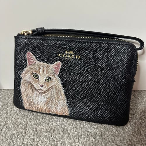 Customer photo review of Coach Wristlet with Custom Pet Portrait