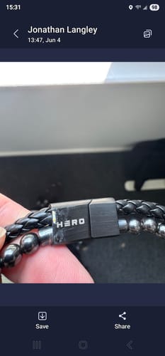 Customer photo review of FIDES Cross Leather & Magnetic Hematite Titanium Bead Bracelet: Helps Pair Veterans With A Service Dog Or Shelter Dog