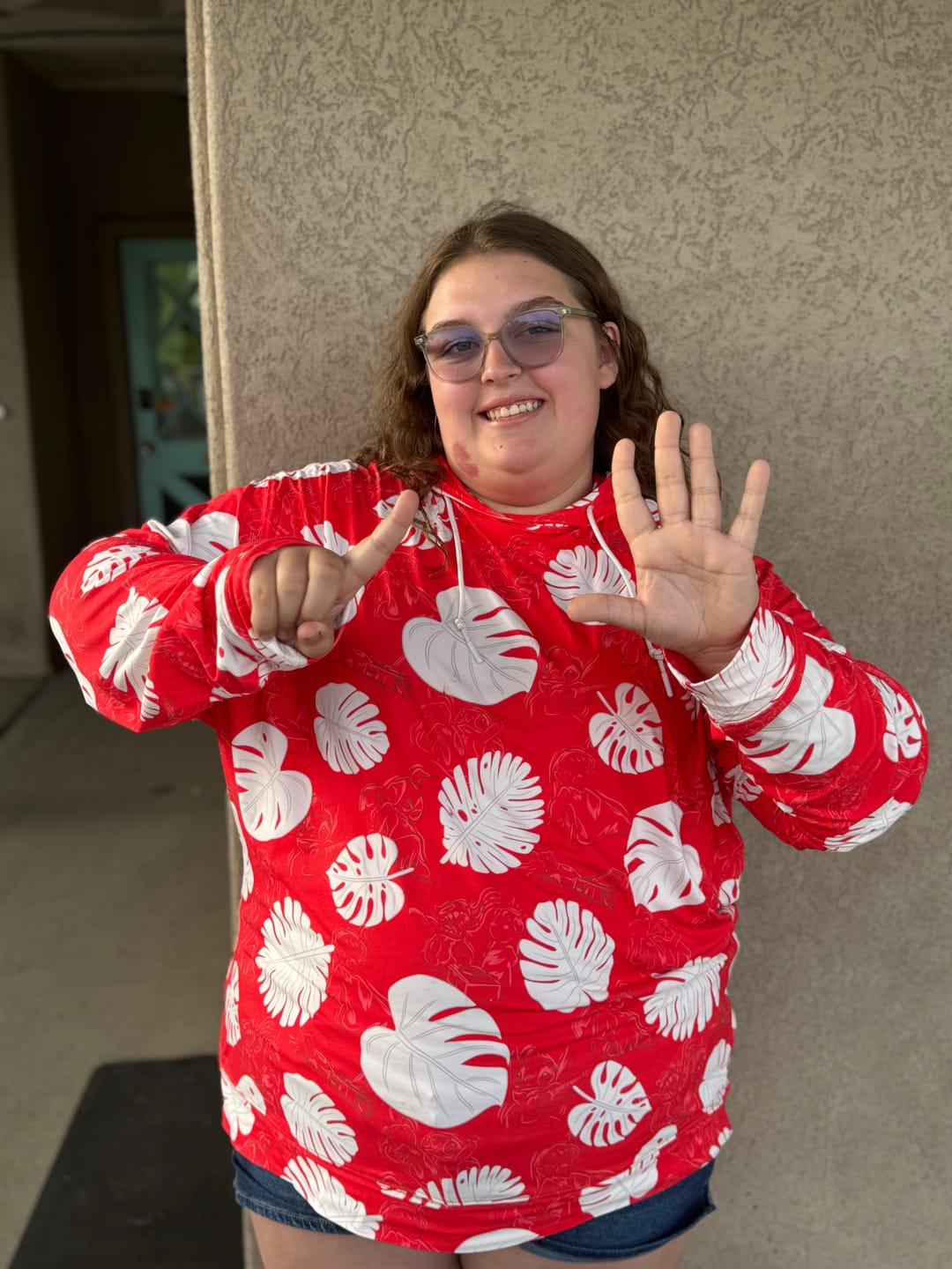 Customer photo review of Disney's Lilo & Stitch "He Mele No Lilo" – Performance Hoodie