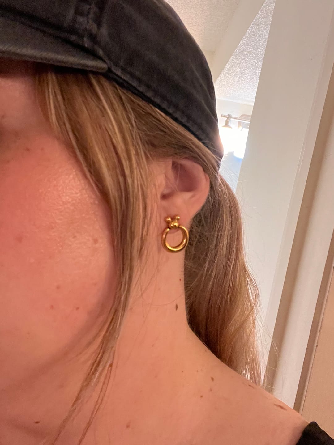 Customer photo review of Mini Leader of the Club Earrings