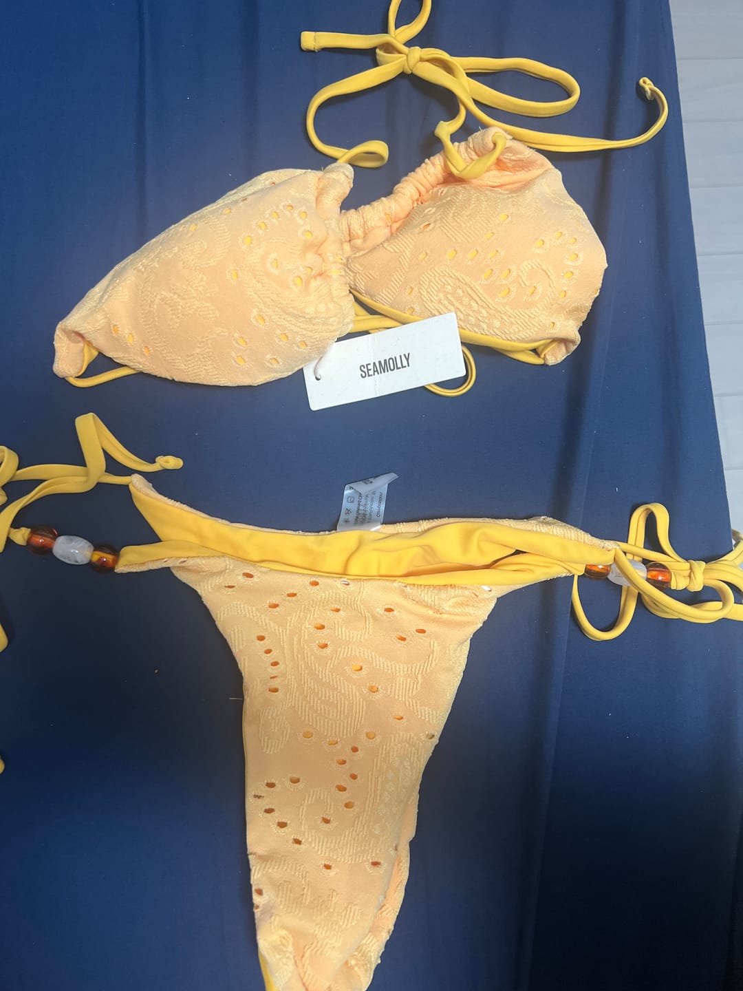 Customer photo review of Seamolly Vintage Lace Eyelet Jacquard Beading Design Halter Triangle Tie Side Bikini Set