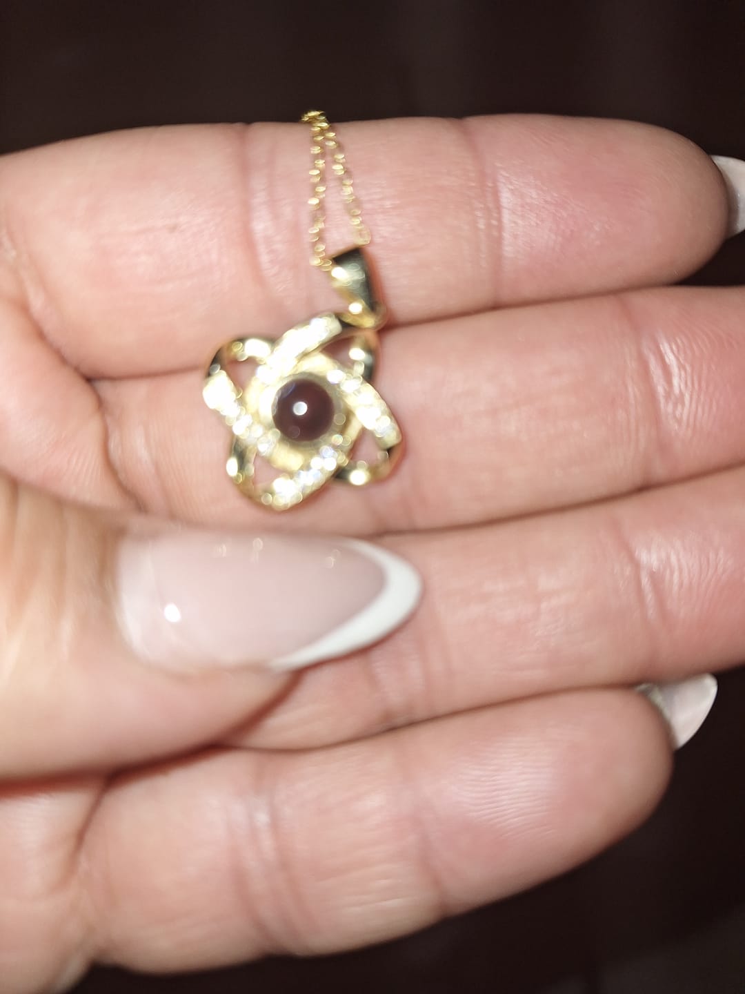 Customer photo review of Personalized Photo Projection Necklace