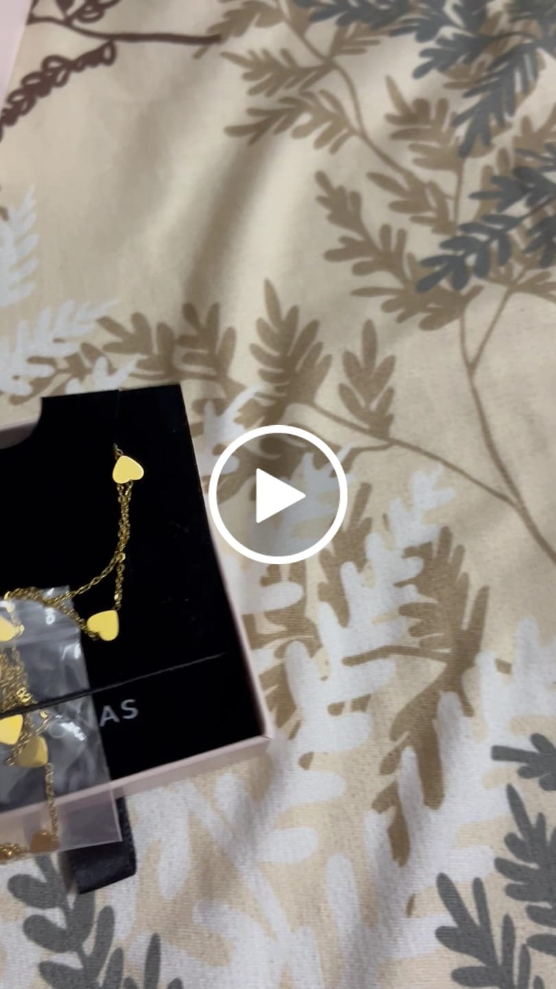 Customer video review of Two-Layered Heart Charm Necklace