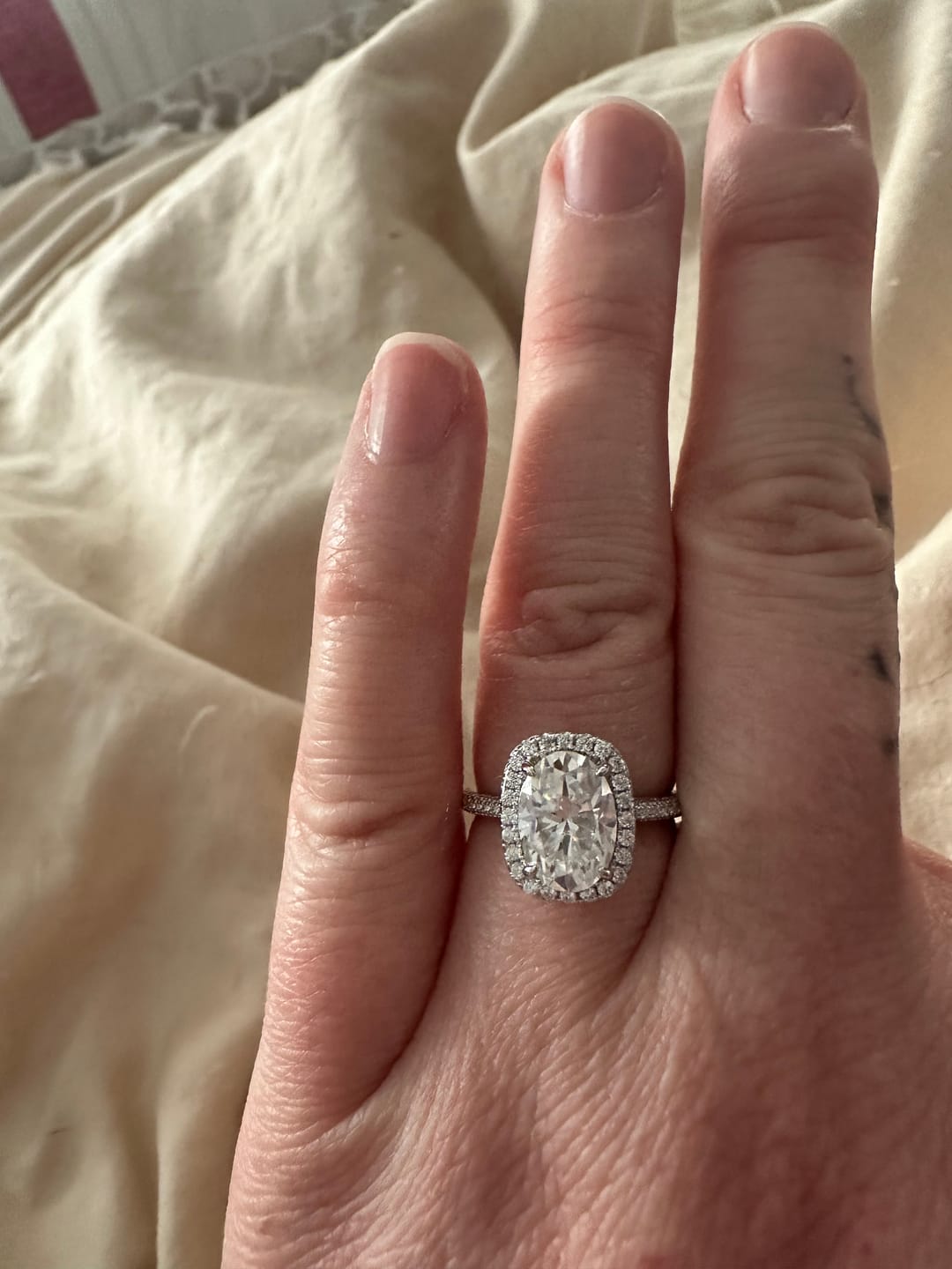 Customer photo review of Rodiffy Moissanite 2.5 Ct Halo Oval Cut Promise Ring For Women