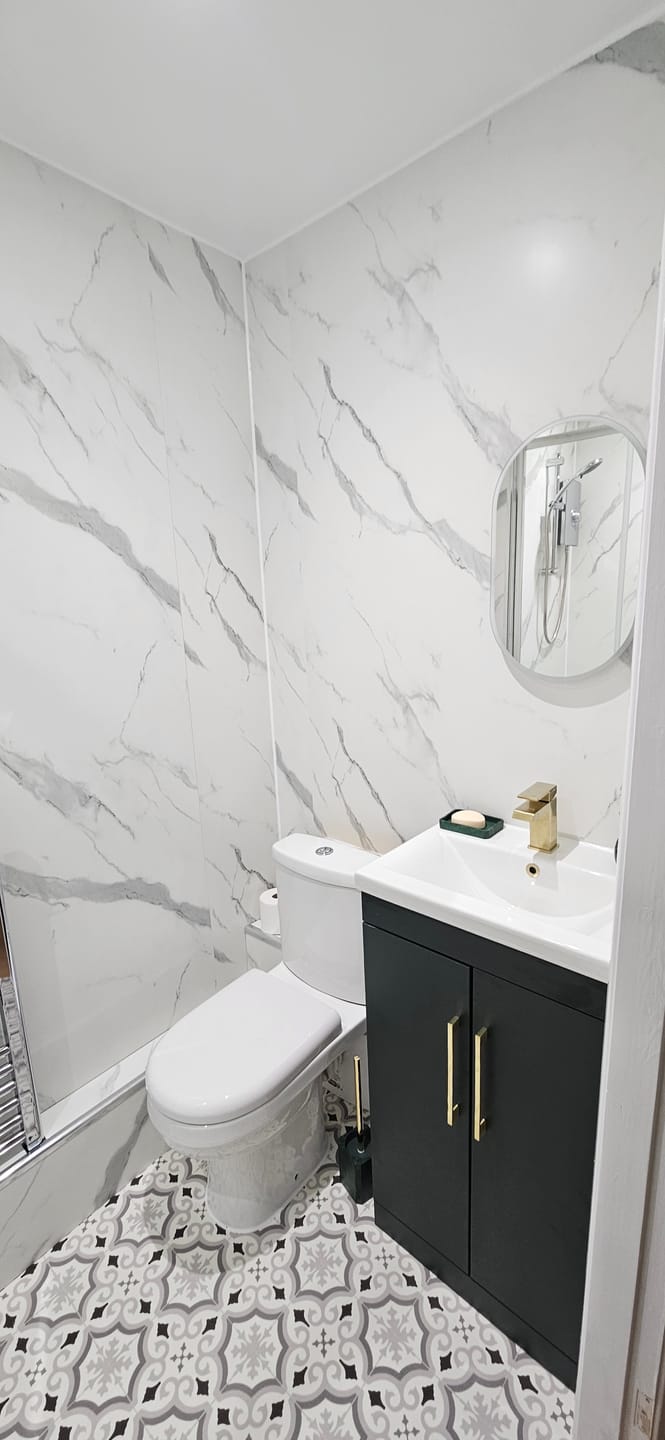 Customer photo review of 10mm Large Tile Carrara Marble Matt Shower Panel 1M x 2.4M