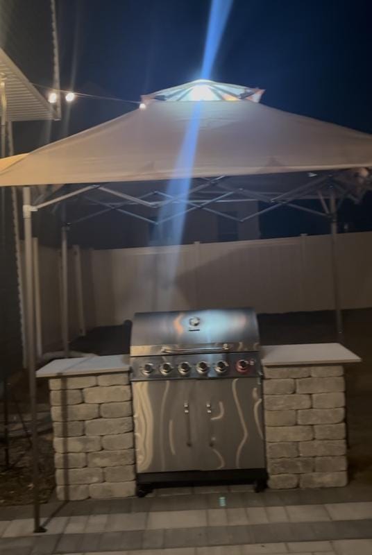 Customer photo review of SUNJOY 8x5 Pop up Grill Gazebo with Magnetic LED Light and Carrying Bag - Gray