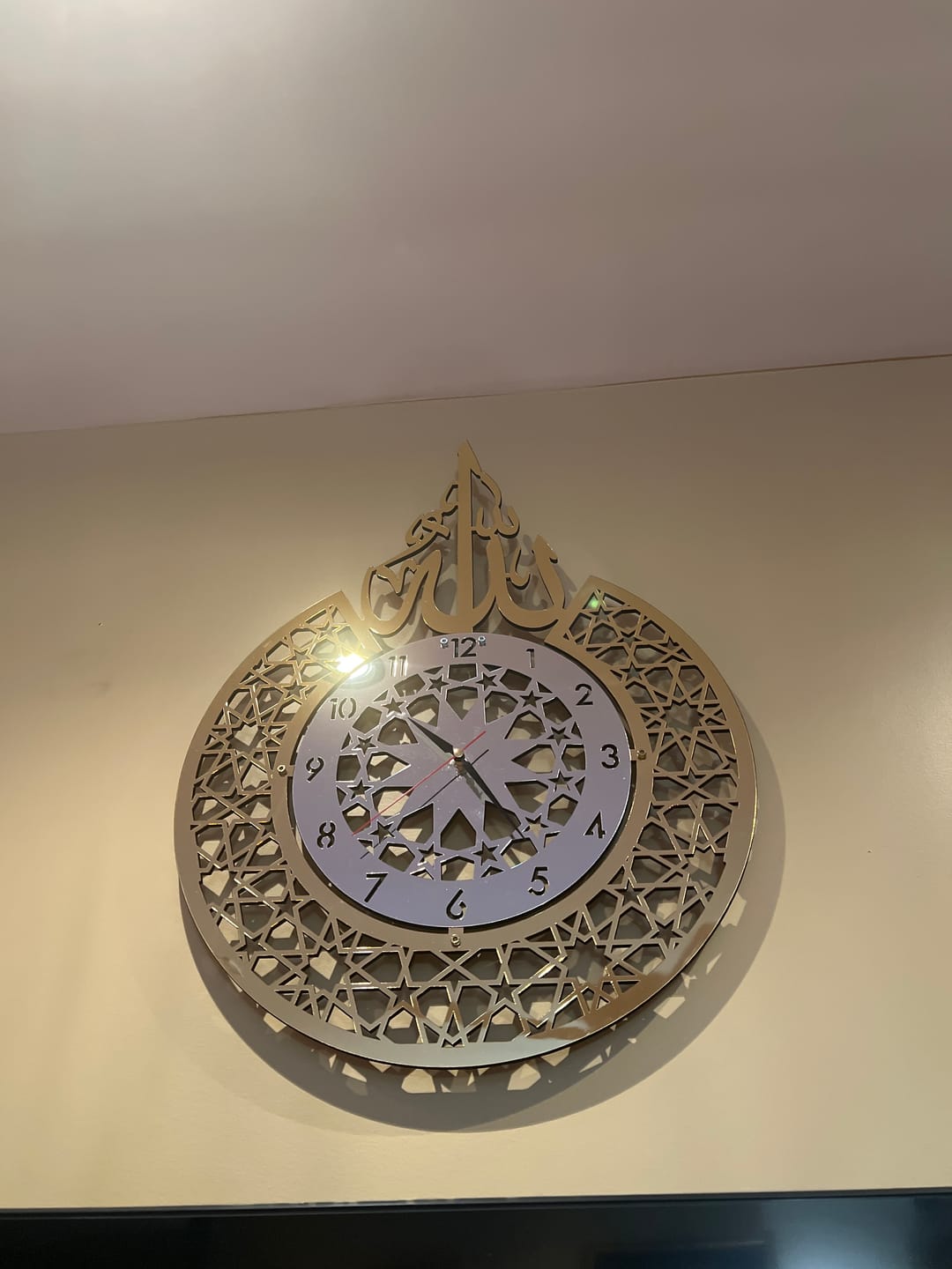 Customer photo review of Allah (SWT) name Islamic Wall Clock With Latin Numbers