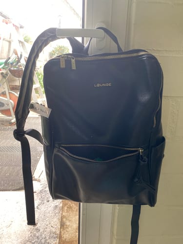 Reseña con foto de un cliente sobre Mochila Notebook Detalle Puller