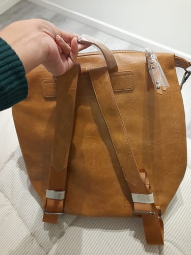 Reseña con foto de un cliente sobre Cartera Mochila Boho