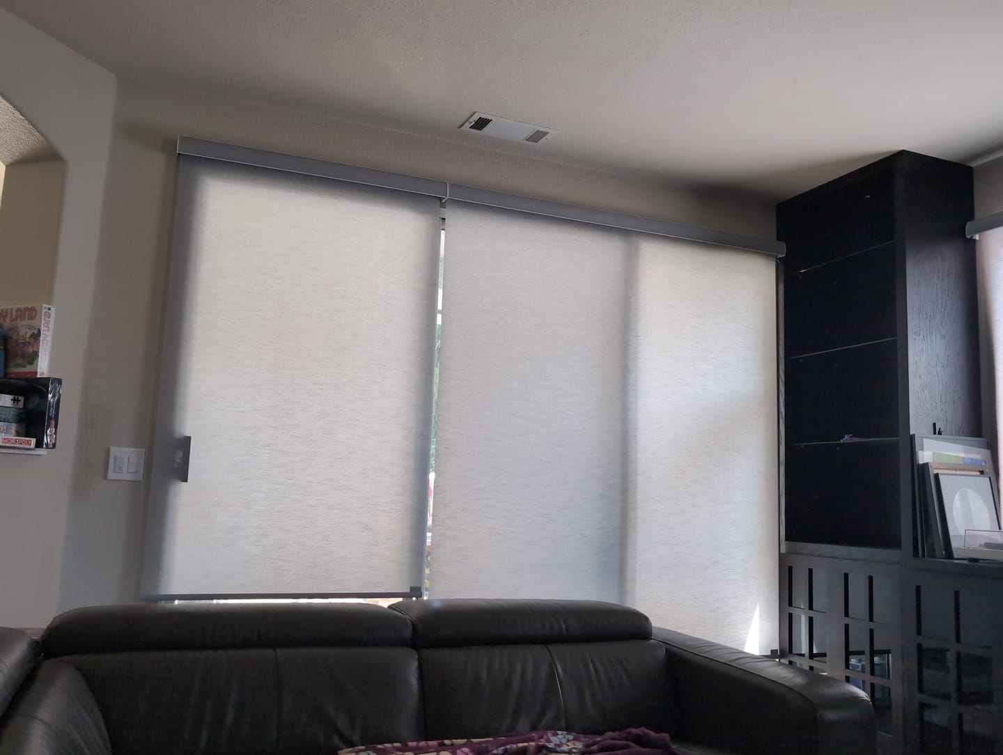 Customer photo review of SmartWings Motorized Light Filtering Roller Shades 70% Blackout Essential